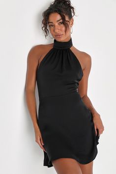 Everyone will know that your middle name is ""fabulous"" when you're seen wearing the Lulus Give 'Em Glam Black Satin Sleeveless Halter Mini Dress! Textured woven satin shapes this flirty dress that has a sleeveless bodice that gathers at the halter neckline, securing with a triple button closure above a sultry open back. The fitted waist tops a skater skirt that falls to a mini hem. Hidden back zipper/clasp. Fit: This garment fits true to size. Length: Mid-thigh. Size medium measures 31.5" from top to bottom. Bust: Great for any cup size. Waist: Fitted - very fitted at natural waist. Hip: Not Fitted - fuller skirt allows room for hips. Undergarments: May be worn with an adhesive bra, petals, or no bra. Fabric: Fabric has no stretch. Fully lined. Shell: 95% Polyester, 5% Spandex. Lining: 1 Black Dance Dresses, High Neck Homecoming Dresses, Mini Dress Backless, Backless Cocktail Dress, Short Graduation Dresses, Cruise Dress, Halter Cocktail Dress, Casual Formal Dresses, Black Backless Dress