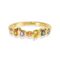 An equisite balance of fancy color diamonds and bold gold, this beautiful bezel-set ring boasts a row of multi shape and color diamonds, harmoniously coming together to create a marvelous rainbow effect.  About us: Paloma Diamonds is a manufacturer and distributor of premium diamonds, in a wide range of carats and colors. Forty years of experience in the diamond industry have placed Paloma as a leading manufacturer in its field. Paloma Diamonds is a family business, based on transparency and tru Yellow Multi-stone Sapphire Ring, Elegant Multicolor Rings With Rose Cut Diamonds, Luxury Yellow Sapphire Multi-stone Ring, Yellow Gold Multi-stone Sapphire Ring With Cubic Zirconia, Yellow Gold Multi-stone Cubic Zirconia Diamond Ring, Elegant Multicolor Rings With Bezel Setting, Fine Jewelry Multicolor Rings With Rose Cut Diamonds, Multicolor Rose Cut Diamond Rings, Anniversary Multicolor Rose Cut Diamond Rings