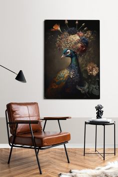 a chair and table in a room with a large painting on the wall above it