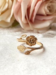 Please Read   Photos are enlarged to show detail. Please read the measurement in the description. ☑️ The gold ring is Bronze and adjustable. ♥️ Follow us and like us on Instagram for discount codes and new designs @mathewandmarieco Floral Gold Ring, Adjustable Gold Flower Ring, Gold Flower Ring Gift, Gold Open Flower Ring For Promise, Adjustable Gold Ring With Rose Design, Yellow Gold Rings With Rose Design For Gift, Dainty Rose Gold Ring With Rose Design, Dainty Rose Design Rose Gold Ring, Adjustable Gold Rose Design Jewelry