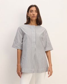 The Supima® Cotton Tunic Optic White / Black – Everlane Modern Short Sleeve Blouse For Everyday, Summer Cotton Tunic For Work, Summer Workwear Cotton Tunic, Oversized Blouse With Rolled Short Sleeves, Chic Cotton Short Sleeve Workwear Top, Casual Short Sleeve Tunic For Work, Chic Cotton Short Sleeve Top For Work, Casual Short Sleeve Workwear Tunic, Summer Workwear Tunic In Relaxed Fit