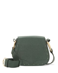 Vince Camuto Vince Camuto Tal Crossbody Leather Bag Evergreen/Goldtone Hardware - NWT Back in the saddle: equestrian-inspired silhouttes have returned and are more chic than ever, as evidenced in the Tal Crossbody. Perfectly sized to carry your essentials, this topstitched, studded bag is detailed with oversize stirrup hardware. Two exterior slip pockets and two interior pockets keep phone, keys and lipstick handy. Product Details Leather Studded front flap Oversize stirrup hardware sides Lacque Green Designer Shoulder Bag, Green Leather Satchel With Gold-tone Hardware, Luxury Green Saddle Bag With Adjustable Strap, Green Textured Leather Bags For Work, Luxury Green Saddle Bag With Detachable Strap, Elegant Green Bags With Brass Hardware, Green Satchel With Gold-tone Hardware For Work, Chic Green Leather Saddle Bag, Green Crossbody Saddle Bag With Removable Pouch