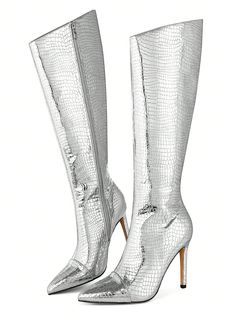 Elevate your fashion game with Reflective Glamour's Metallic Knee-High Stiletto Boots. These boots feature a sleek, reflective design that adds a touch of glamour to any outfit. Perfect for the fashion-forward woman in search of statement footwear. Color : Silver Snake Closure Type : Back Zipper Insole Material : Fabric Lining Material : Microfiber Leather Outsole Material : Rubber Upper Material : PU Leather Fitted Silver Glamorous Knee-high Boots, Glamorous Fitted Silver Heeled Boots, Silver Fitted High Heel Boots, Trendy Metallic Boots For Night Out, Metallic Fitted Glamorous Boots, Fitted Silver Heeled Boots For Night Out, Silver Boots For Club, Silver Fitted Knee-high Boots, Metallic Fitted Heeled Boots With Pointed Toe