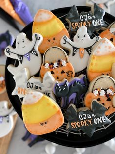 This is a picture of decorated Halloween cookies for a first birthday. The Spooky One First Birthday Boy, 1st Birthday Halloween Theme Boy, Halloween Themed 1st Birthday Party, One Spooky Dude Birthday, October First Birthday Boy, Halloween First Birthday Boy, First Birthday Halloween Theme, Booday Party