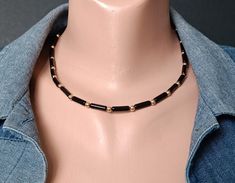 black onyx choker necklace details gold plating 14 K, jewelry unisex fashion style men gift, for him for her gift to father The length of +/- 17.2 inches - 43.5 cm). Recommendations for care: Do not wet, do not drop, avoid contact with perfumes, detergents. Wear with pleasure! Modern Black Choker Jewelry, Classic Black Choker Jewelry, Unisex Fashion Style, K Necklace, Choker Gold, Unisex Jewelry, Choker Necklaces, Fashion Mode, Necklace Jewelry