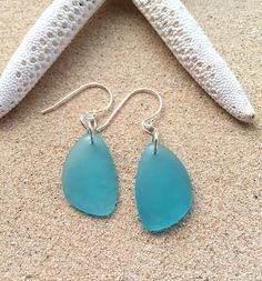 Turquoise Aqua Blue Beach Glass Earrings, Sterling Silver & Blue Sea Glass Earrings,  Sterling Silver Beach Glass Earrings, Beach Earrings by KailuaKai on Etsy https://www.etsy.com/listing/260593067/turquoise-aqua-blue-beach-glass-earrings Sea Glass Teardrop Earrings For Beach, Blue Sea Glass Nickel Free Earrings, Blue Teardrop Sea Glass Earrings, Blue Sea Glass Nickel-free Earrings, Nickel-free Blue Sea Glass Earrings, Handmade Blue Sea Glass Earrings, Blue Ear Wire Earrings For The Beach, Beach Earrings With Sea Glass And Ear Wire, Beach Sea Glass Earrings With Ear Wire