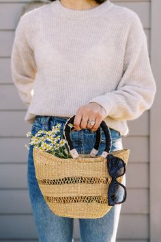 Perfect for gathering groceries from your local market, flowers from the mart or packing your beach picnic. Genuine leather handles make this stand out from the rest. Handmade woven baskets from Ghana, West Africa. Made by Christopher Azaba and his family. Material is hand-harvested elephant grass. Summer Bucket Bag With Top Carry Handle, Spring Vacation Beach Bag With Rolled Handles, Spring Travel Straw Bag With Rolled Handles, Spring Beach Bag With Rolled Handles In Natural Color, Spring Beach Bag With Rolled Handles For Everyday Use, Spring Everyday Beach Bag With Rolled Handles, Spring Natural Beach Bag With Rolled Handles, Spring Travel Beach Bag With Round Handle, Summer Straw Bag With Rolled Handles For Spring