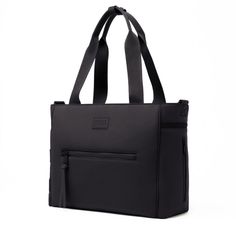 a black tote bag with zippers on the front and side, sitting against a white background