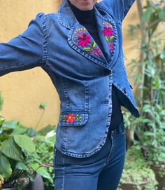 Boho jeans jacket hand embroidered and huipil from chichi | Etsy Fitted Bohemian Outerwear With Floral Embroidery, Fitted Denim Jacket With Floral Embroidery For Summer, Fitted Floral Embroidered Outerwear For Festivals, Fitted Cotton Folk Outerwear, Folk Style Fitted Cotton Outerwear, Fitted Folk-style Cotton Outerwear, Fitted Bohemian Denim Jacket With Floral Embroidery, Fitted Denim Jacket With Multicolor Embroidery, Fitted Cotton Outerwear With Multicolor Embroidery