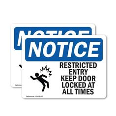 two blue and white notice signs with the words restricted entry keep door locked at all times