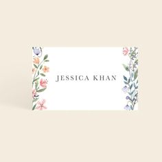 a business card with watercolor flowers on it and the words, jessica khan