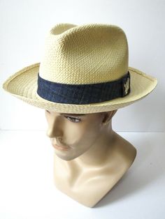 BRAND: Stefano Ricci SIZE: Marked as M COLOR: Neutral with Blue Ribbon MATERIAL: 100% Panama - 45% Wool 30% Cashmere 15% Silk 10% Linen FEATURES: - luxurious Stefano Ricci Sisal panama hat - stylish ribbon bow detail - galvanized palladium flying eagle hardware - made in Italy - sold out on the Stefano Ricci website ABOUT US: We are here to get you top designer luxury items for very affordable prices with up to 75% off the original prices with free shipping to any address in the USA.  All of our Designer Beige Flat Brim Hat, Designer Wide Brim Beige Hats, Designer Beige Wide Brim Hat, Designer Adjustable Hats For Travel, Designer Beige Adjustable Hat, Designer Adjustable Beige Hat, Designer Flat Brim Travel Hat, Designer Brimmed Beach Hats, Designer Flat Brim Hat For Travel