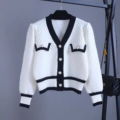 Cardigan, loose, new, v-neck short sweater coatMaterial:knittedStyle:sweetFeatures:looseColor:as picturesize:freelength:46,bust:96,sleeve:52,shoulder:36&ltp&gtNote:Due to different measurement methods,there will be 1-3 error(unite:cm), please understand.</p>&ltbr/>&ltp&gtPlease check the size carefully when you choose items,thank you.</p>&ltbr/> White V-neck Sweater Coat For Winter, Trendy White V-neck Sweater For Winter, Elegant V-neck Knitted Cardigan, Elegant V-neck Knit Sweater Coat, Trendy White Knitted V-neck Sweater, Spring V-neck Knitted Sweater Coat, White V-neck Cardigan, White V-neck Outerwear For Fall, Trendy White V-neck Cardigan