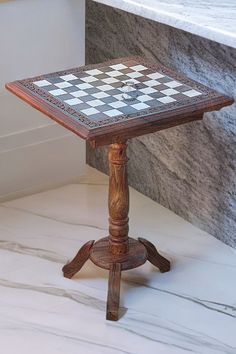 a small table with a chess board on it