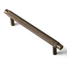 an antique brass finish pull handle on a white background with clipping for text or image