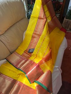 Chanderi Pure Handloom Handwoven Traditional With Blouse Saree's 🥻 👉🏻 Golden zari taraj naxi jakat Ariya eknaal ekjuttya havy adda border work saree  👉🏻 All Over eknaal golden zari sikka eknaal ghani butti work saree  Fabric :- 🧵 ~Katan~ Silk Saree🧵 Note:- fall pico not included code 87 Yellow Slub Silk Dupatta For Transitional Season, Yellow Slub Silk Traditional Wear For Navratri, Traditional Tissue Silk Wear For Celebration, Bollywood Style Kora Dupatta, Celebration Traditional Wear In Tissue Silk, Traditional Kora Tissue Silk Saree, Festive Slub Silk Traditional Wear For Puja, Diwali Kora Dupatta, Tissue Silk Saree With Kora Details