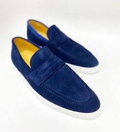 Style: 529-32S-Blue Supple Suede slip-on Penny Slot Loafer from our Maurice collection, features full Calfskin lining and an Athletic Inspired Rubber Sole! Blue Leather Sole Slip-on Moccasins, Classic Blue Slip-ons For Business, Casual Blue Slip-ons With Contrast Sole, Blue Slip-on Moccasins, Classic Blue Slip-on Boat Shoes, Navy Suede Loafers With Rubber Sole, Classic Low-top Slip-ons With Suede Lining, Suede Low-top Loafers For Business Casual, Blue Slip-on Business Moccasins