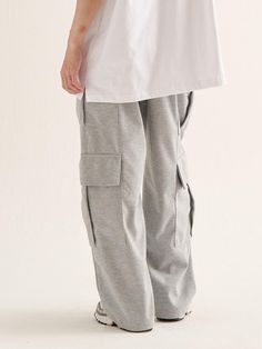 This is a casual and minimal pants by Analogmood that is made out of high quality and sturdy material. With distinctive mood of the design and comfortable wear, you can use it for your daily outfit.- Relaxed wide silhouette- Big cargo pockets detail on the side- Sweat fabric with soft touch and elasticity Gray Cotton Wide Leg Parachute Pants, Gray Wide Leg Cotton Cargo Pants, Gray Wide Leg Cotton Parachute Pants, Gray Straight Pants For Streetwear, Gray High-waisted Pants For Streetwear, Gray Cotton Straight Cargo Pants, Baggy Gray Cargo Pants With Elastic Waistband, Gray Relaxed Fit Straight Leg Cargo Pants, Gray Straight Cotton Cargo Pants