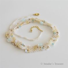 Bib Style Beaded Necklace with Crystals and Faceted Beads in Cream, Bronze and Teal. OOAK Free Form Sea Inspired Textured Necklace S258 by SmadarsTreasure on Etsy https://www.etsy.com/listing/11478697/bib-style-beaded-necklace-with-crystals Handmade Ocean-inspired Beaded Necklaces, Handmade Ocean-inspired Gold Beaded Necklaces, Necklace Grunge, Soulmate Necklace, Grunge Jewelry, Beaded Necklace Patterns, Necklace Patterns, Wrap Necklaces, Sea Inspired