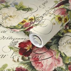 a wallpaper with flowers and writing on it