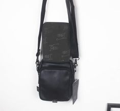 Material: PU
Texture: Soft
Closed: Zipper
Size: 7.1"L x 2.4"W x 5.5"H in; It is enough to hold daily stuffs including cell phones, sunglasses, wallet, key etc.
Baldric: Adjustable shoulder strap Casual Portable Shoulder Bag For Everyday Carry, Black Rectangular Phone Bag For Everyday Carry, Black Rectangular Phone Bag For Everyday, Travel Phone Bag With Zipper Pocket, Black Phone Bag With Zipper Pocket For Travel, Black Phone Bag With Zipper For Everyday Use, Multifunctional Phone Bag With Zipper For Everyday Use, Multifunctional Travel Phone Bag With Zipper Closure, Multifunctional Travel Phone Bag With Zipper