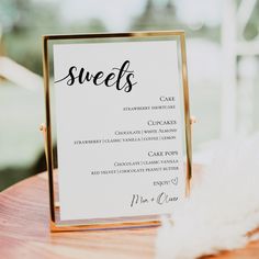 a table with a sign that says sweets on it