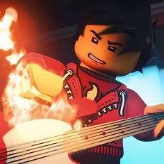 a lego man holding a guitar in front of a fire