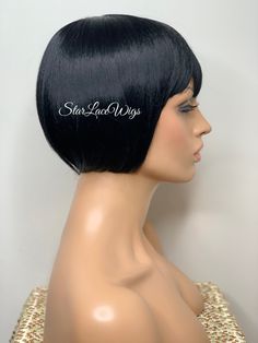 Beautiful short bob wig with bangs. You will absolutely love this straight bob wig. Type of Hair:  Synthetic Hair Texture:   Straight  Hair Length:   Bob Hair Color:   Available in #1, #1b & #2 Cap Style:   This is a regular wig (NOT A LACE FRONT) - (cap stretches)  Heat Safe:   Heat resistant up to 350 degrees      HEAT SAFE The synthetic and human hair blend wigs in the store are heat safe and can be curled and flat ironed.  Please note that it is recommended that the heat settings be low (340 Short Bob Wig With Bangs, Black Bob Bangs, Short Black Wigs With Bangs, Black Bob Wig With Bangs, Bob Hair Color, Black Bob, U Part Wigs, Wigs For Sale, Short Bob Wigs