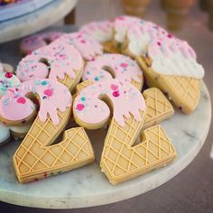 there are some ice cream and donuts on the table