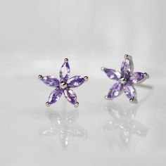 purple flower silver stud earrings Dazzling Cubic Zirconia Flower Shaped Earrings, Sparkling Cubic Zirconia Flower Earrings For Anniversary, Cubic Zirconia Flower-shaped Earrings, Anniversary Flower Earrings With Sparkling Cubic Zirconia, Flower Shaped Cubic Zirconia Earrings With Sparkling Stones, Flower Shaped Cubic Zirconia Jewelry With Gemstone, Fine Jewelry Flower Shaped Cubic Zirconia Jewelry, Fine Jewelry Flower-shaped Cubic Zirconia Jewelry, Fine Jewelry Cubic Zirconia Flower Jewelry