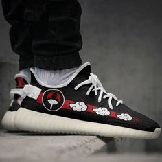 Step into the world of Naruto with our Itachi Akatsuki Cloud Shoes. Inspired by the iconic Yeezy sneaker design, these shoes are a must-have for any Naruto anime fan. Made with high-quality materials, these sneakers offer both style and comfort. Featuring the Akatsuki cloud pattern on the sides, these shoes pay homage to the legendary Itachi Uchiha. The vibrant red color symbolizes power and passion, making a bold statement wherever you go. The breathable mesh upper ensures your feet stay cool a Itachi Anime, Akatsuki Cloud, Itachi Akatsuki, Anime Sneakers, Cloud Shoes, Sneaker Design, Fan Anime, Yeezy Sneakers, Anime Shoes