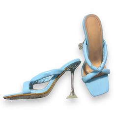 Discover Ultimate Comfort And Style With The Ulta High Heel. This Slip-On Shoe Is Made From Wear-Resistant Pu Leather With A Blue Finish, And Features A Rubber Outsole And Pu Leather Lining For Incredible Durability. Take Your Everyday Look To The Next Level! Good Condition/ Never Worn Ulta High Heel Heel Size: 4.5’ Slip On Size: 38 Wear- Resistant Pu Leather Blue Outsole Material: Rubber Lining Material: Pu Leather Light Blue Sandals For Spring Party, Light Blue Party Sandals For Spring, Light Blue Synthetic Sandals For Evening, Trendy Light Blue Party Sandals, Light Blue Open Toe Heels For Party, Light Blue Sandals With Padded Heel For Evening, Blue Open Toe Sandals For Cocktail, Light Blue Evening Sandals With Padded Heel, Light Blue Evening Sandals With Wrapped Heel