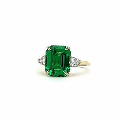 "This is a emerald cut 3 stone emerald green engagement ring in 14k solid gold. This simple emerald ladies ring makes a  unique  May Birthstone gift. Also great for an anniversary, mothers day, Christmas, Holiday Black Friday gift idea for mom, girlfriend, grandmother, sister daughter or any family or friends gift for her. for emerald earrings click here: https://etsy.me/3AN4nqW for emerald rings click here: https://etsy.me/3JIov0a for emerald pendants click here: https://etsy.me/3Td2gnv Radiant Green Three Stone Emerald Cut Jewelry, Gift Emerald Ring With Three Stones In Radiant Cut, Green 14k Gold Emerald-cut Rings, Green Three-stone Emerald-cut Emerald Ring, Three-stone Emerald Cut Green Emerald Ring, Green Three Stone Emerald Cut Emerald Ring, Green Emerald Cut Three Stone Emerald Ring, Green Emerald Cut 14k Gold Rings, Green Three Stone Baguette Cut Ring