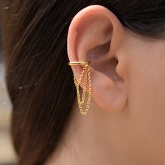 ✈️ Free DHL Express shipping to USA, EU countries & Canada - delivery in just 2 days! This totally handmade 925 sterling silver huggie ear cuff with chain requires no piercing. Available in plain silver. rose gold or yellow gold plated over sterling silver body. Price is for a single piece. Select to buy a pair in a better price from the drop down list. Base metal is 925 solid sterling silver, plated with: - Rhodium (plain silver finish) or - 18K rose gold (rose gold finish) or - 24K gold (y Gold Plated Huggie Ear Cuff Single Earring, Adjustable Gold Plated Single Ear Cuff, Adjustable Single Gold Plated Ear Cuff, Dainty Gold Plated Single Ear Cuff, Dainty Gold-plated Single Ear Cuff, Silver Gold-plated Single Ear Cuff, Adjustable Gold Ear Cuff With Chain, Gold Dangle Ear Cuff Single Earring, Gold Dangle Pierced Ear Cuff