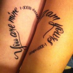 two people with tattoos on their arms that say, you are mine and now there is love