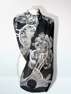 Black scarves 'Peony' is a hand painted silk scarf decorated with black and white flowers. This black and white foulard will make a wonderful gift for someone very special. Peony silk scarf is hand painted by me. It's design was inspired by a Art-Nouveau style of drawing flowers and baroque ornaments. This black silk scarf is a one of a kind wearable piece of art. It will go stunningly with a black dress or any other smart outfit. This foulard is decorated with 11 big peonies and two complimenta Black Silk Scarves As A Gift, Black Artistic Silk Scarf, Artistic Black Silk Scarves, Artistic Black Silk Scarf, Scarf Painting, Flowers Peony, Design Art Nouveau, Black Silk Scarf, Baroque Ornament