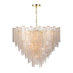 a chandelier made out of glass blocks and gold chains on a white background