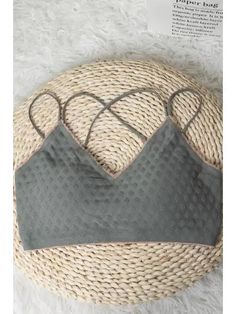 Textured pattern spaghetti strap bralette. Spring Strappy Sports Bra With Built-in Bra, Trendy Sports Bra With Built-in Bra, Trendy Seamless Crop Top Bra, Trendy Seamless Bra, Trendy Camisole Sports Bra, Trendy Cropped Seamless Bra, Trendy Crop Top Bra For Spring, Trendy Triangle Crop Top With Built-in Bra, Trendy Spring Crop Top Bra