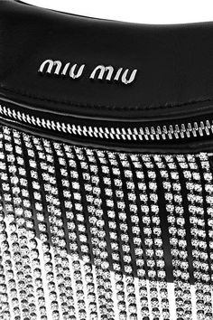 Miu Miu belt bag in napa leather with crystal fringe. Adjustable strap secures around waist. Removable cross body strap. Zip top closure with tassel pull. Logo lettering at center front. Satin lining interior details. Measurements: 4.7"H x 9.5"W. 110 cm detachable silver metal chain shoulder strap Country of Origin: Made in Italy Luxury Bags With Rhinestone Fringe, Miu Miu Belt, Crystal Fringe, Crystal Belt, Fringe Bags, Wallets For Women Leather, Belt Bags, Red Stone, 7 H