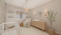 a baby's room with a crib and dresser