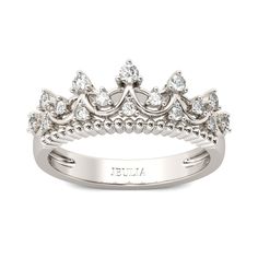 Treat your princess to a dazzling crown ring that perfectly fits her personality. Crafted in sterling silver, this cute ring is topped with a crown and scattered with shimmering round stones. Beautiful and sweet, this royal choice is sure to be adored.Carat Weight: 0.065 ctStone Size: 2 mmStone Type: Jeulia® StoneNumber of Stones: 1 Stone Color: Diamond WhiteStone Shape: RoundCarat Weight: 0.429 ctStone Size: 1.2,1.5,1.7 mmStone Type: Jeulia® StoneNumber of Stones: 17 Stone Color: Diamond WhiteS Crown Ring Design, Ring Design Silver, Crown Wedding Band, Cute Crown, Crown Rings, Rings Pandora, St Michael Pendant, Jewelry King, Sterling Silver Promise Rings