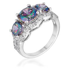 This ring is filled with prismatic beauty because of three round mystic cubic zirconia set at the top in rhodium plated prongs. The three stones are set right over a generous number of clear round cubic zirconia that adds sparkle and showiness. Setting Type: Prong Stone Size: 8mm X 6mm X 1.15mm Stone Cut: Round Trio Ring, Cz Rings Engagement, Three Stone Rings, Three Stone, Stone Ring, Cocktail Rings, Quality Jewelry, Stone Rings, Rhodium Plated