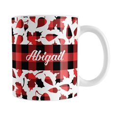 a red and black plaid mug with the word abraad on it