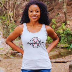 Elevate your wardrobe with our premium "Baseball Mom" tank top! Designed to make a statement, this sleek racerback guarantees to catch attention. Show your pride and support for your favorite player with confidence in this stylish piece! Crafted from extra-light fabric (60% combed, ring-spun cotton and 40% polyester: 4 oz/yd² or 135 g/m this racerback tank is exceptionally lightweight and perfect for an active lifestyle. The classic fit ensures comfort during high-performance activities, while the scooped neckline adds a sporty touch to your ensemble. Plus, for added convenience, all tanks feature a tear-away label for a seamless, scratch-free experience, allowing you to conquer your day with ease. Available in six vibrant colors to match your unique style. See more of our racerback tank t Sports Tank Top With Letter Print, Fitted Casual Tank Top For Sports Events, Casual Fitted Tank Top For Sports Events, Casual Tank Top With Team Name For Sports Events, Sporty Tank Top With Team Name For Sports, Casual Sports Tank Top With Team Name, Casual Athletic Heather Tank Top For Sports, Casual Letter Print Tank Top For Sports Events, Sports Racerback Tank Top With Letter Print