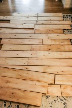 wood flooring being laid out on the ground