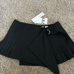 Black Pleated Mini Skirt . Never Been Used Zara Pleated Bottoms For Night Out, Zara Pleated Skirt For Night Out, Zara High Waist Skort For Party, Zara Pleated Mini Skirt For Night Out, Zara High Waist Skort For Night Out, Zara Pleated Party Bottoms, Asymmetrical Black Skort For Night Out, Black Asymmetrical Skort For Night Out, Zara Black Skort For Spring