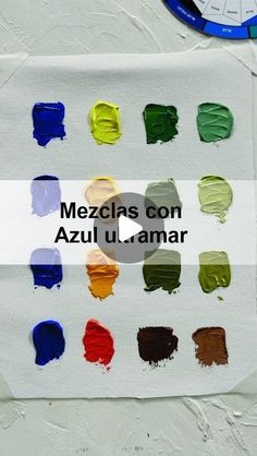 several different colors of paint sitting on top of a piece of paper with the words mezcls con azul u - lamaar