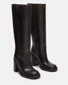 Elevate your style with the WESTLEY boot. With a versatile knee-high design and comfortable block heel, these boots will keep you looking chic and feeling confident all day long. Perfect for any occasion, these are a must-have addition to your shoe collection. 3.75 inch heel height 15 inch shaft circumference 13.25 inch shaft height Leather upper material Synthetic lining Synthetic sock Synthetic sole Fit tip: If you are in between sizes, size up a half-size Imported Modern Knee-high Platform Boots With Stacked Heel, Trendy High Shaft Leather Boots, Casual Knee-high Heeled Boots For Work, Trendy Mid-calf Heeled Boots For Work, Trendy Wide Calf Knee-high Boots With Block Heel, Trendy Tall Knee-high Boots With Stacked Heel, Trendy Tall Knee-high Boots For Work, Trendy Knee-high Boots With Block Heel, Trendy Wide-calf Knee-high Boots With Block Heel