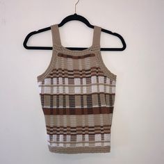 Brown And Tan, Neutral, Heavy Knit But Breathable, High Neck, Textured Beige Stretch Knit Top, Casual Brown Crochet Top With Open Knit, Casual Brown Open Knit Crochet Top, Brown Open Knit Top, Brown Bohemian Knit Tops, Brown Knitted Sleeveless Top, Bohemian Brown Knit Tops, Brown Textured Knit Stretch Top, Trendy Beige Knit Tank Top