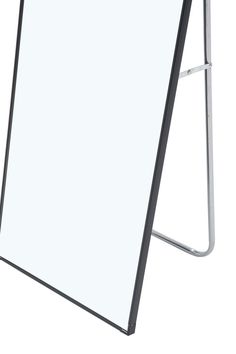 a white board with a metal frame on the top and bottom edge, standing upright